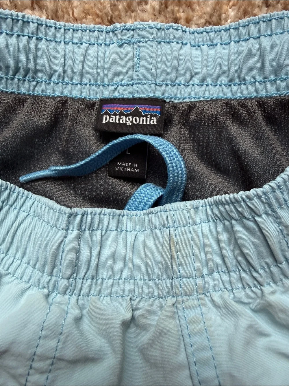 Patagonia Light Blue swim Shorts with liner youth size large